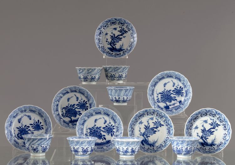 Seven Chinese blue and white cups and saucers