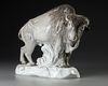 A PORCELAIN SCULPTURE OF A BISON, 20TH CENTURY