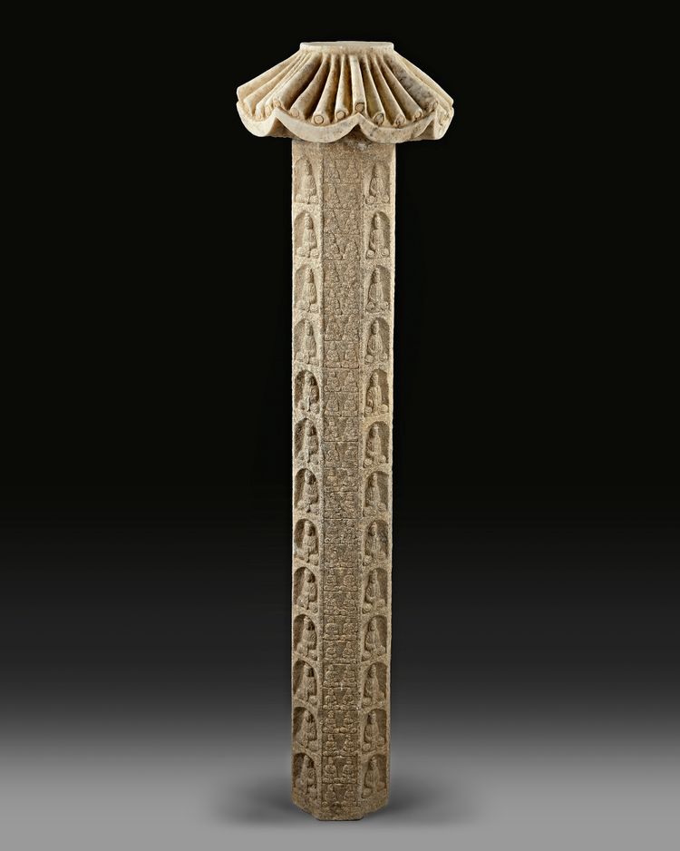 A HUNDRED BUDDHA'S CARVED STONE PILLAR