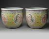 A pair of Chinese famille rose 'dragon and phoenix' jardinieres
