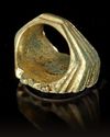 A LATE ROMAN GILDED BRONZE RING, CIRCA LATE 3RD OR EARLY 4TH CENTURY A.D.