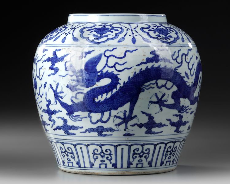 A CHINESE BLUE AND WHITE DRAGON JAR, MING DYNASTY (1368-1644)