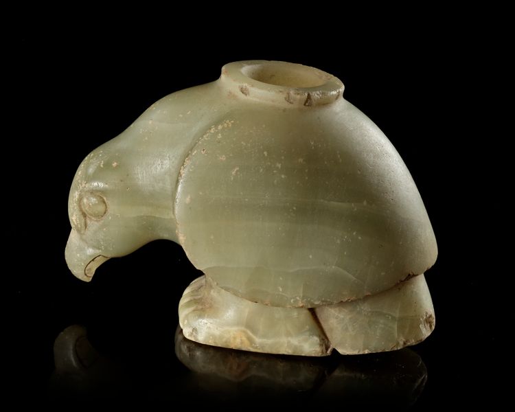 A NEAR EASTERN GREENISH CALCITE VESSEL IN THE SHAPE OF A BIRD OF PREY, 3RD MILLENNIUM BC