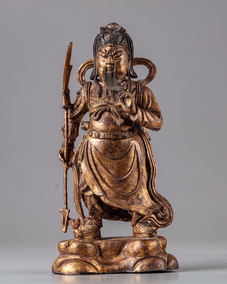 A gilt  bronze figure of Guanyu