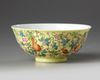 A Chinese yellow-ground famille rose 'gourds' bowl