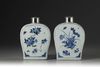 A Pair of Blue and White Tea Caddies with Silver Lids