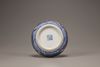 An aubergine-ground blue and white 'dragon' circular box and cover