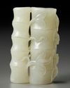 A CHINESE PALE CELADON JADE 'MONKEY AND BAMBOO' CARVING, 19TH-20TH CENTURY
