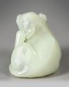 A PALE CELADON JADE CARVING OF A LION, QING DYNASTY (1644–1911),18TH CENTURY