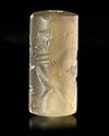 A NEO-ASSYRIAN OR NEO-BABYLONIAN CHALCEDONY CYLINDER SEAL, CIRCA 8TH-7TH CENTURY B.C.