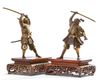 Two Japanese bronze figures of a samurai