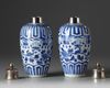 A pair of silver-mounted Chinese blue and white ovoid vases and covers
