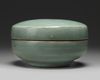 A KOREAN CELADON-GLAZED 'PHOENIX' BOX AND COVER