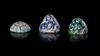 * THREE COBALT-BLUE, GREEN AND TURQUOISE GLASS GAMES PIECES, MESOPOTAMIAN REGION, 8TH-9TH CENTURY