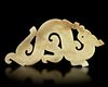 A LIGHT GREEN JADE 'S' DRAGON PENDANT, CHINA, HAN DYNASTY (206 BC-220 AD)