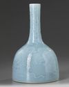 A Chinese pale blue-glazed 'Buddhist lions' mallet vase