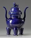 A Chinese blue-glazed tripod censer and cover