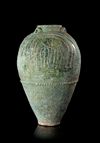 A LARGE UMAYYAD TURQUOISE-GREEN GLAZED JAR, MESOPOTAMIA, 7TH-8TH CENTURY