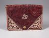 AN OTTOMAN SILVER EMBROIDERED LEATHER WALLET, TURKEY 19TH CENTURY