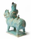 A KASHAN UNDERGLAZE DECORATED FIGURE OF A HORSE AND RIDER, PERSIA, 13TH CENTURY