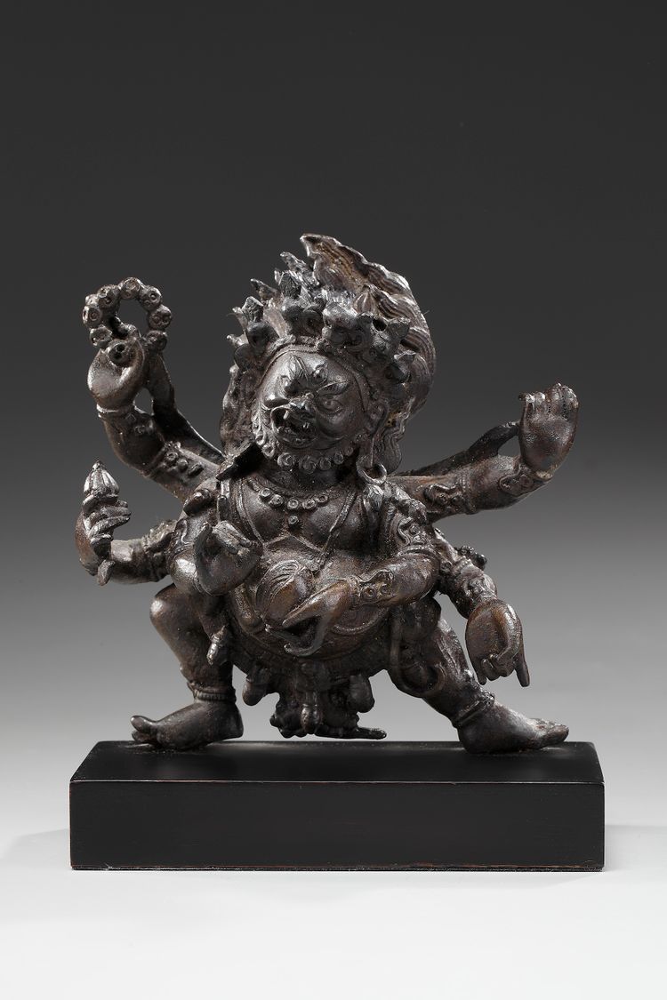 A Sino-Tibetan bronze figure of six-armed Mahakala