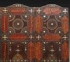A FOUR PANEL LEATHER SCREEN, DATED 1346 AH /1927-28 AD
