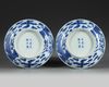 A PAIR OF CHINESE BLUE AND WHITE 'PHOENIX' DISHES