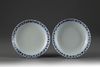 A near pair of blue and white dishes