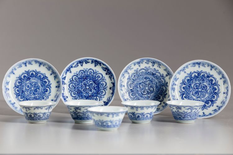 Five Chinese blue and white cups and four saucers