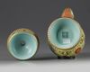 A CHINESE YELLOW-GROUND FAMILLE ROSE TIBETAN STYLE EWER, PENBA HU, QING DYNASTY (1644-1911)