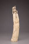 An ivory figure of a standing lady