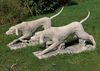 A PAIR OF CARVED LIMESTONE MODELS OF HOUNDS, PROBABELY ENGLISH POINTERS, 20TH CENTURY