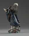 A Chinese enamelled porcelain figure of Liu Hai