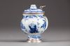 A Chinese blue and white mustard pot with European silver mounts