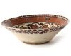 A SAMANID SLIP-PAINTED POTTERY BOWL, PERSIA, 10TH CENTURY