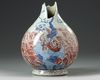 A Chinese copper-red-decorated blue and white 'mythical beasts' vase