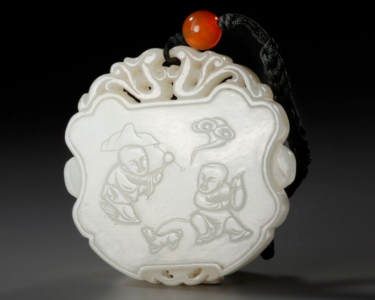 A CHINESE WHITE JADE PLAQUE, 19TH CENTURY