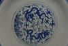 A LARGE CHINESE BLUE AND WHITE DRAGONS DISH, MING DYNASTY (1368-1644) OR LATER
