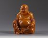 A Chinese soapstone figure of Budai