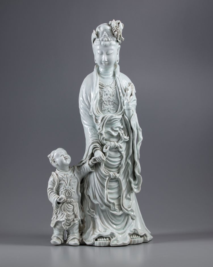 AN EXCEPTIONAL LARGE DEHUA GLAZED FIGURE OF A GUANYIN WITH A CHILD, 20TH CENTURY