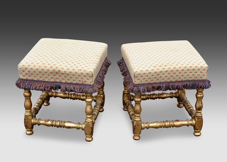 A PAIR OF FRENCH CARVED AND GILDED WOODEN POOFS, LOUIS XIII STYLE, LATE 19TH CENTURY