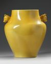 A CHINESE MUSTARD YELLOW GLAZED VASE WITH DEAR HANDLES