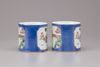 A pair of Chinese powder-blue and famille verte mugs
