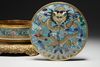 A cloisonne circular box with cover on a gilt bronze base