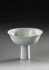 A CHINESE WHITE-GLAZED STEM BOWL, 17TH CENTURY