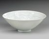 A FINELY CARVED QINGBAI 'BOYS' CONICAL BOWL, SONG DYNASTY (960–1279)