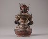 A bronze figure of Guanyin