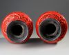 A PAIR OF CHINESE CARVED CINNABAR VASES, 19TH-20TH CENTURY