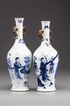 Two similar moulded Chinese blue and white twin-handled vases