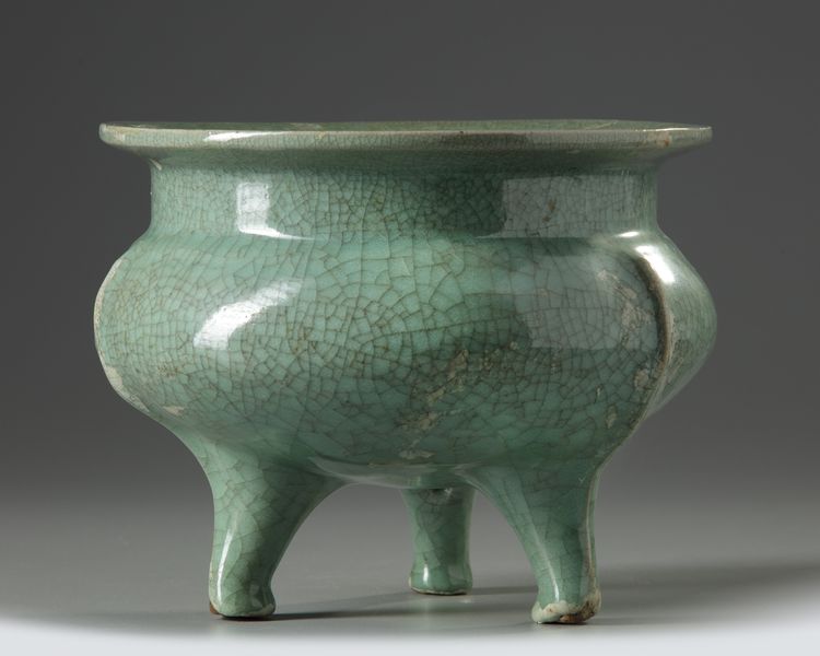 A large Chinese celadon tripod censer